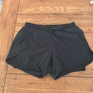 ALL IN MOTION RUNNING SHORTS. Has spandex shorts underneath and pockets!